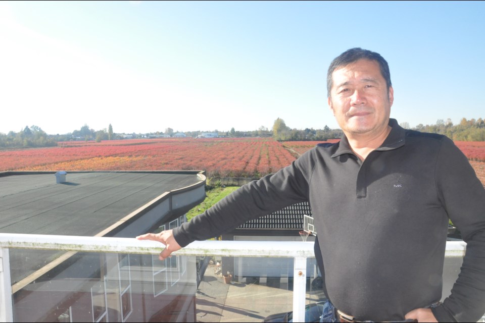 Jian He, owner of a B&B and blueberry farm, suggests ‘farm tourism’ as a good business model that would make farming profitable. Daisy Xiong/Richmond News