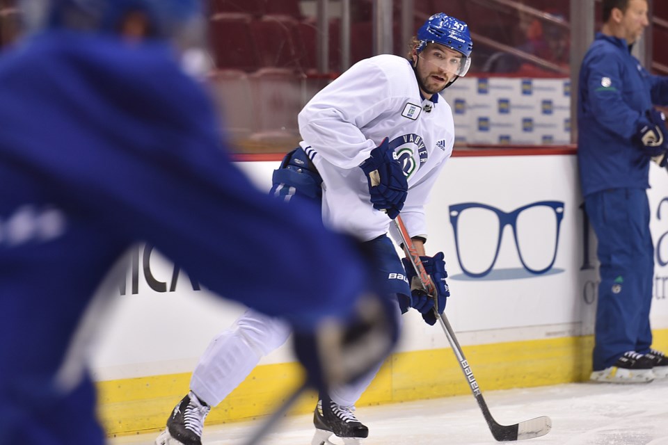 Sven Baertschi looks for a pass at Canucks practice