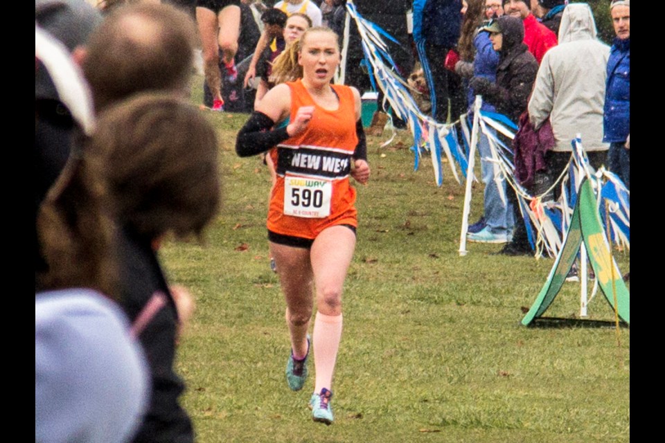 New Westminster's Grace Fetherstonhaugh strides to the finish line at the B.C. High School cross country championships in Vancouver last week. The Royal City Track and Field club member finished second in senior girls.
