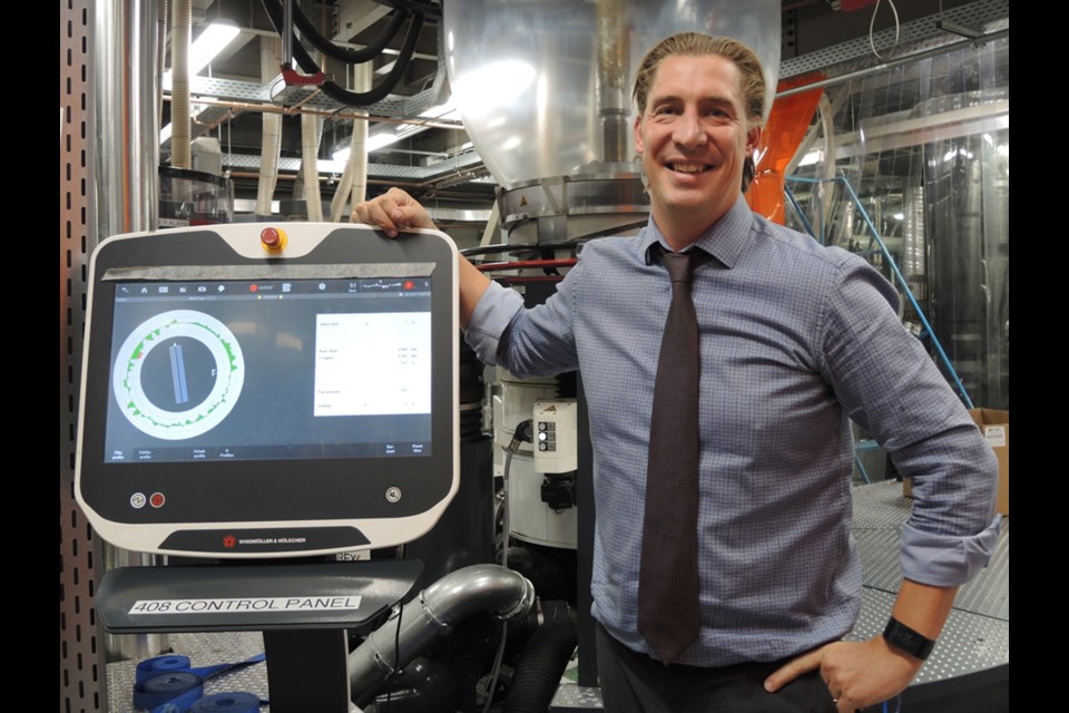 Flexible Packaging vice-president Mark Rose inside his company’s packaging facility at 11120 Silversmith Place in south Richmond. The company has designed a more environmentally-friendly plastic that degrades within 10 years. Photo by Daisy Xiong/Richmond News