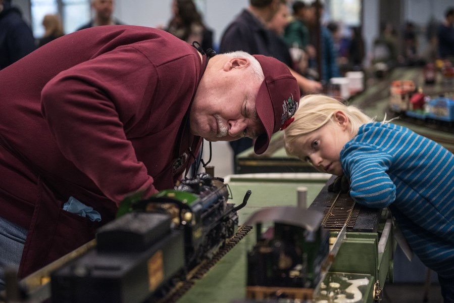 Greater Vancouver Garden Railway Club member John Shortreid lit one of the club’s live steam-powered trains during the 35th annual Vancouver Train Expo at the PNE Forum. Photo Rebecca Blissett