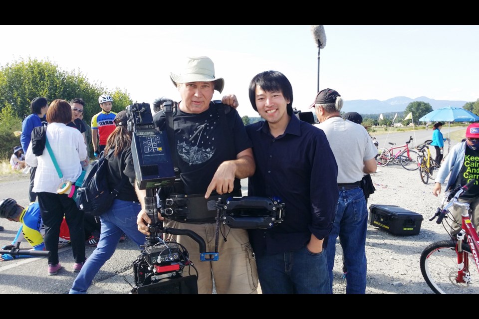 Commercial filming activity generated $26 million in wages for local residents in 2016. Richmond-based director and producer Eric Zhang (right front) and director of photography Cliff Hokanson are pictured shooting a Taiwanese film on Iona Beach. Photo submitted
