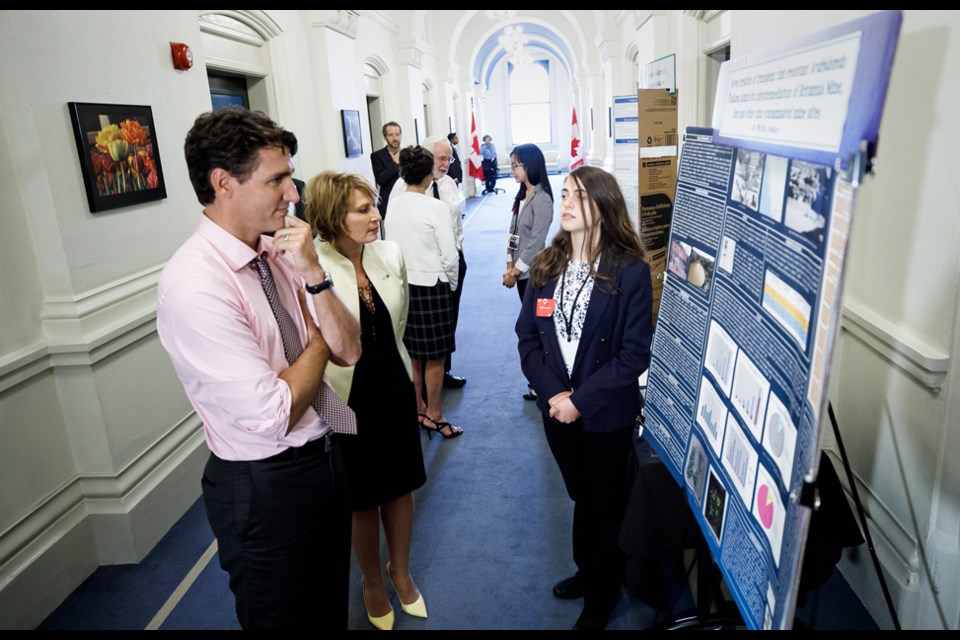Prime Minister Justin Trudeau and Canada’s newly appointed chief science advisor, Mona Nemer chat with Burnaby teen Phyllis Lesnikov at the first-ever Prime Minister’s Science Fair in Ottawa in September.