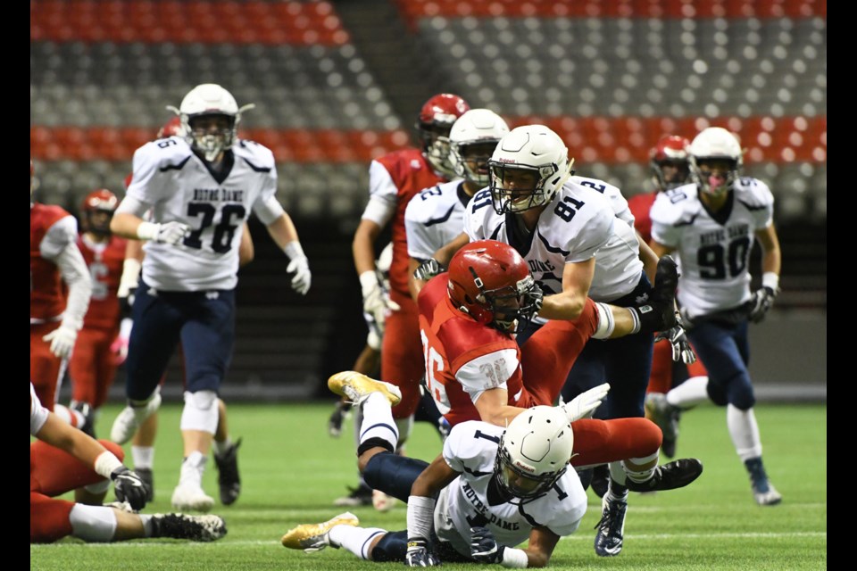 St. Thomas More’s Joel Pielak, above centre, filled in admirably for all-star Tyler Eckert last week, scoring the game's first touchdown and rushing for more than 130 yards in the team's 32-13 win over Notre Dame, earning the Knights a berth in Saturday's semifinals at BC Place.