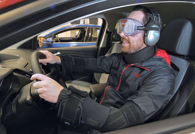 Reporter Andy Prest does some horrendous driving while wearing a Drunk Driving Suit at Cam Clark Ford in North Vancouver. Ford uses the suit as an educational tool for young drivers. photo Paul McGrath, North Shore News