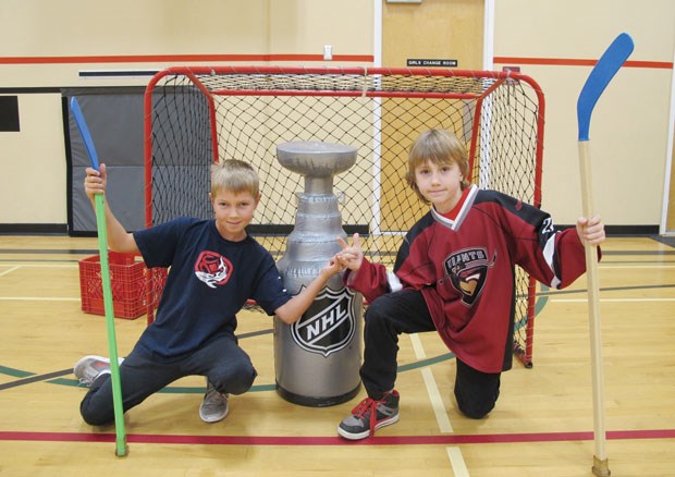Rhys Dupuis, Lincoln Pavlich and Charlie Taylor (not pictured) have organized the Neilson Grove Primary Hockey League.