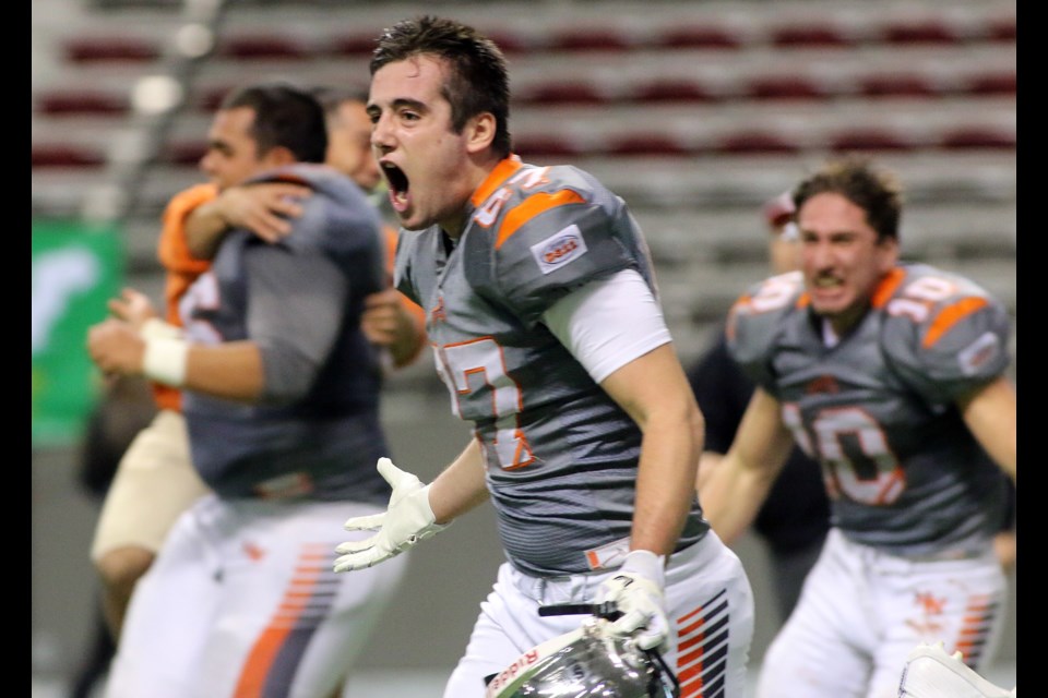 New Westminster Hyacks tight end Finn Stark reacts after the team's successful two-point conversion that gave the team their first BC Secondary Schools Football Association Subway Bowl championship.