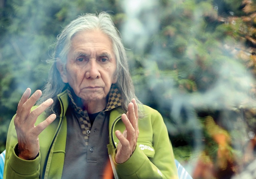 Leonard George prays at a sacred fire at Whey-ah-Wichen/Cates Park in September 2012. file photo Mike Wakefield, North Shore News