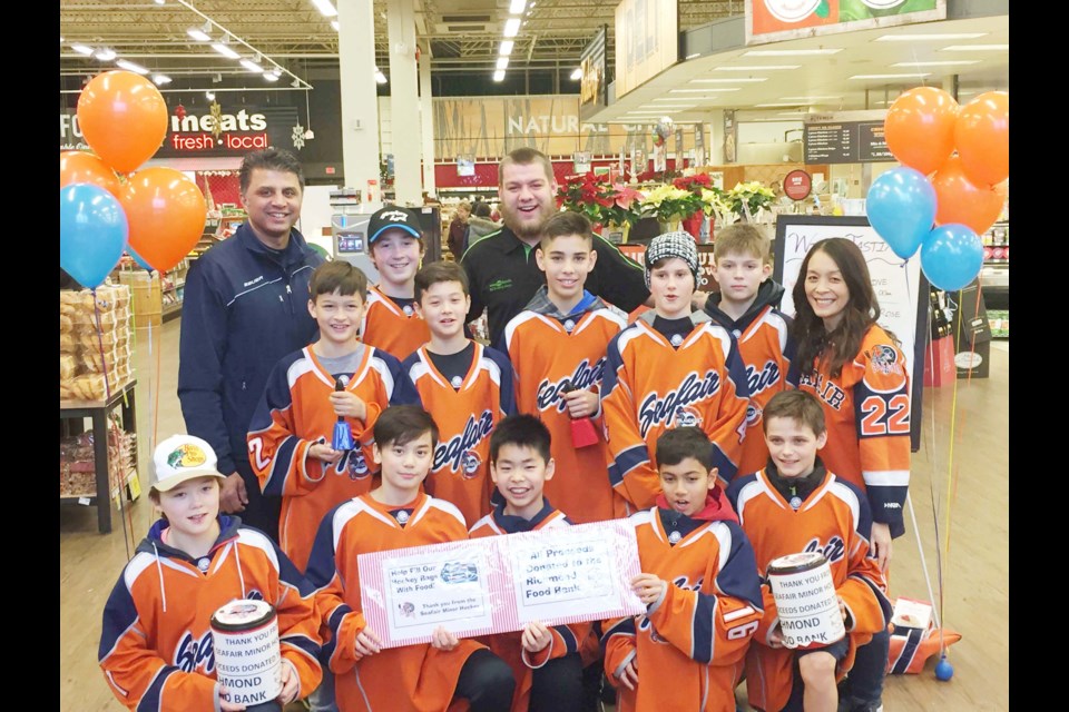 Seafair Minor Hockey had another successful year running its Food Bank Drive at Save on Foods (Ironwood) on Sunday, Dec. 3. This year, they raised $1,003 and collected 300 food items for the Richmond Food Bank. Photo submitted