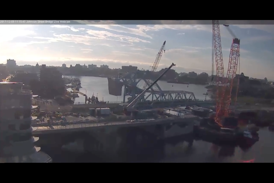 A screen grab from the Johnson Street bridge web cam shows the crane in place this morning.