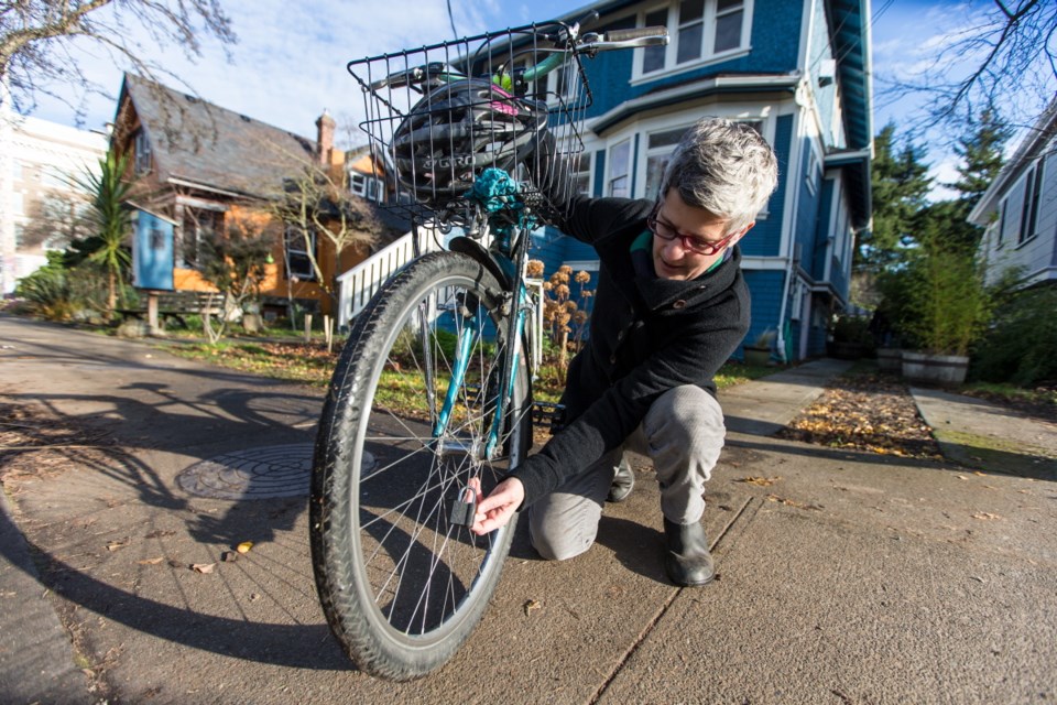 Victoria Mayor Lisa Helps shows one of the two padlocks that were attached to her bike's spokes.