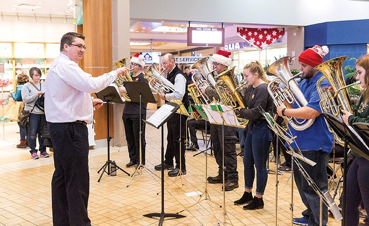 Matt Wood, left, leads TUBACHRISTMAS on Saturday afternoon at Pine Centre Mall. It was the 44th Anniversary of TUBACHRISTMAS but it was the first time being held in Prince George. Citizen Photo by James Doyle