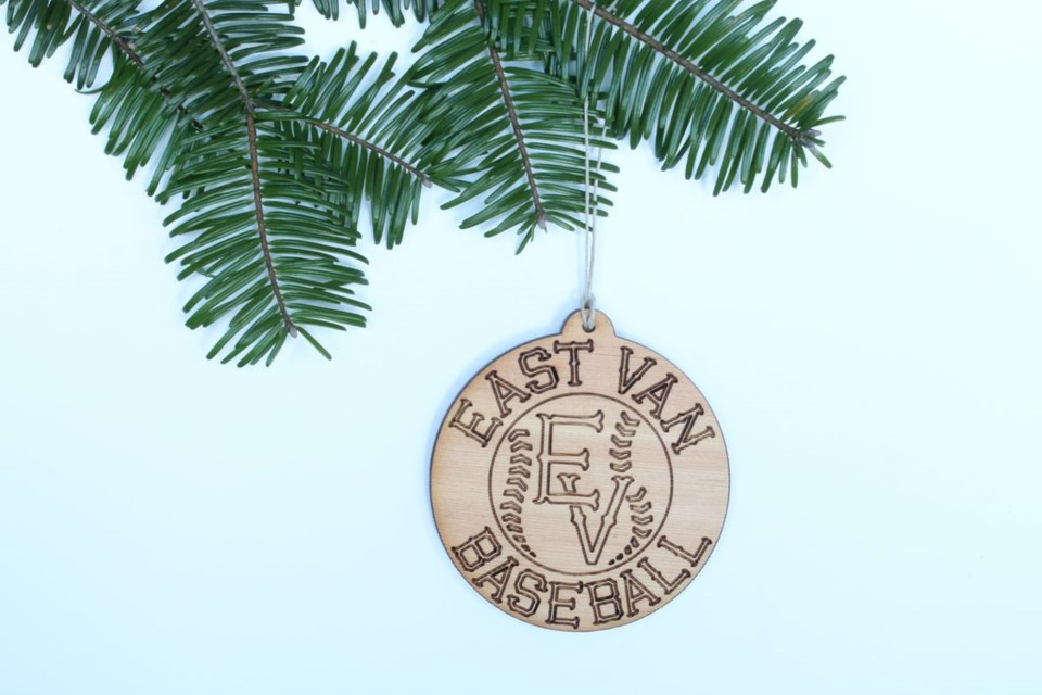 An ornament made from first-growth wood salvaged from Vancouver's demolished pre-1940s homes