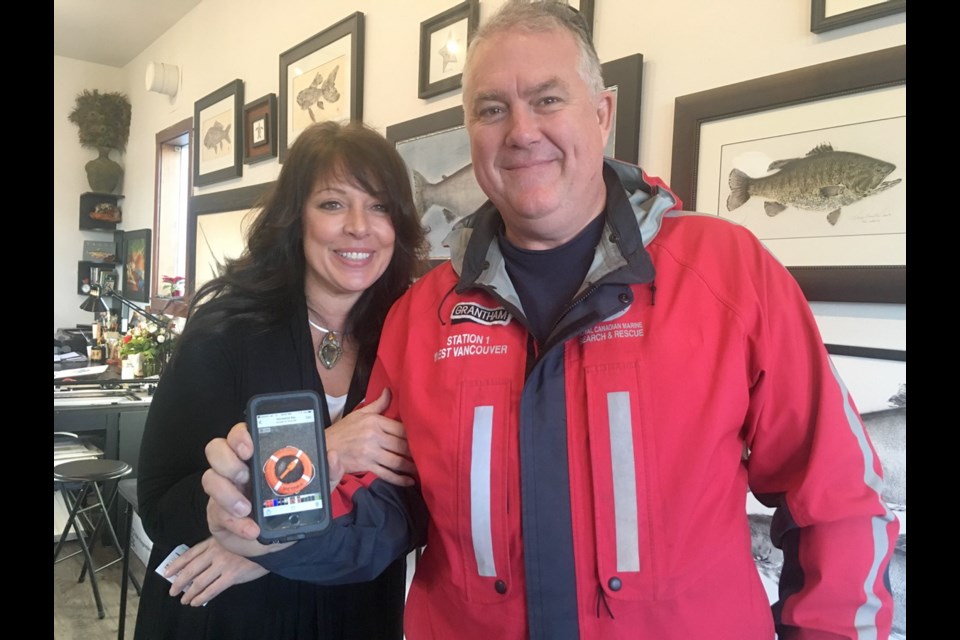 Mya DeRyan with Ian Grantham of the Royal Canadian Marine Search and Rescue, and a photo of the life ring that helped Grantham and his crew spot DeRyan in the ocean. On Oct. 30, DeRyan jumped from the B.C. Ferries vessel Queen of Cowichan.