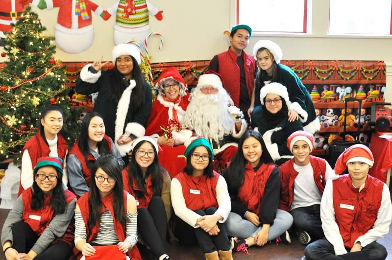 These festive volunteers helped make Cambie Community Centre’s annual Breakfast with Santa on Saturday a great success. Photo by Julia Olsen