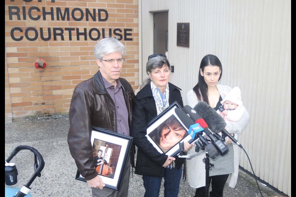 Brad Dean's parents, Tom and Lianne, with Brad's wife, Adele, and five-month-old daughter, talk to media outside Richmond Provincial Court