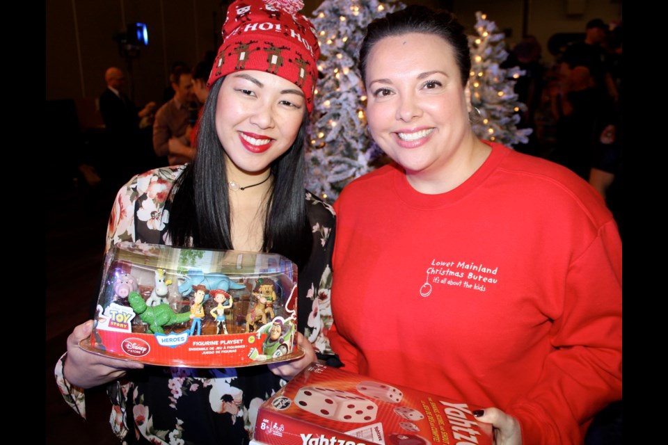 The Lower Mainland Christmas Bureau’s Angela Lee and Darya Sawycky were all smiles following the outpouring of love demonstrated at this year’s toy drive. More than 24 tonnes of toys were collected, including 650 bikes.