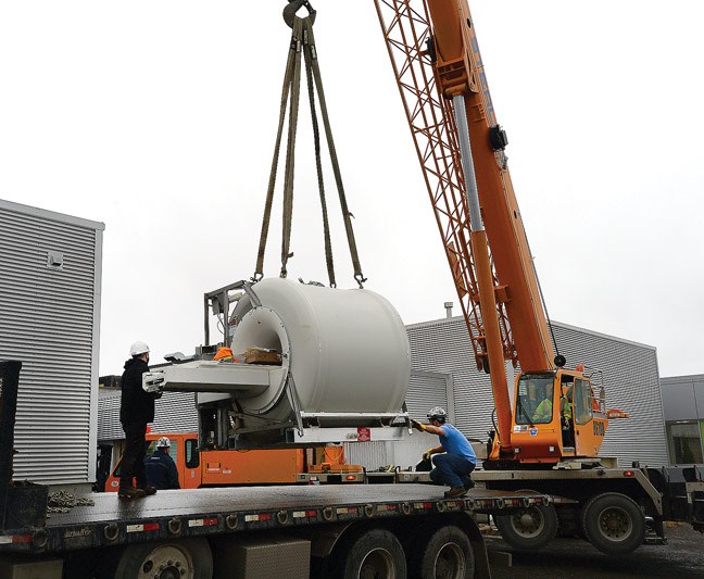 Crews remove a 5,500 kg MRI unit from the University Hospital of Northern B.C. Thursday afternoon. The 14-year-old unit will be replaced by a new MRI unit that should be up and running by mide to late June. A mobile MRI unit will serve patients for about four months while a new MRI suite is constructed. Citizen photo by Brent Braaten Feb 16 2017