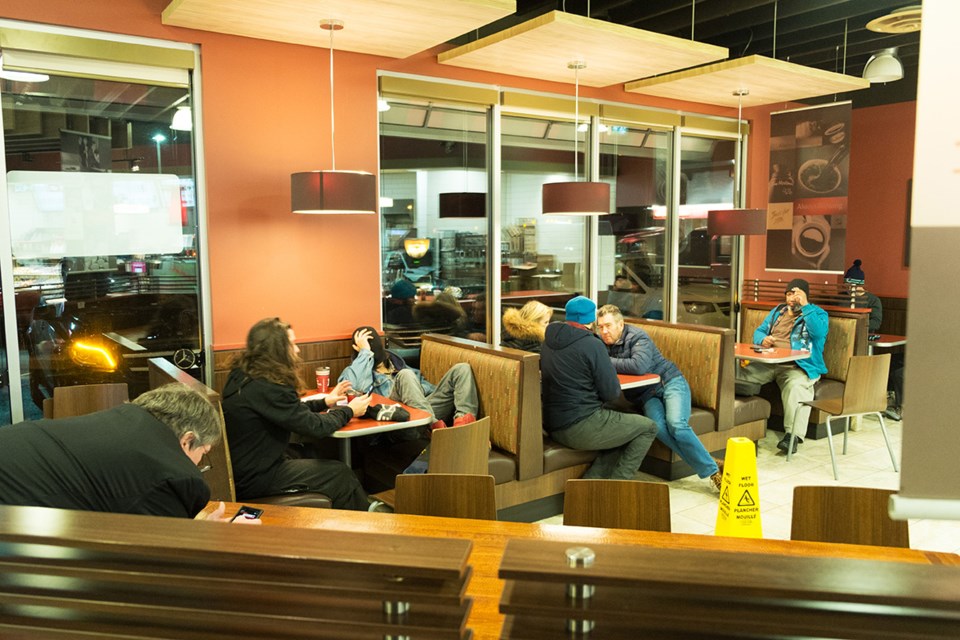 The Chief photographer David Buzzard captured this image of people waiting for Highway 99 to reopen at 2 a.m. Wednesday at Tim Hortons.