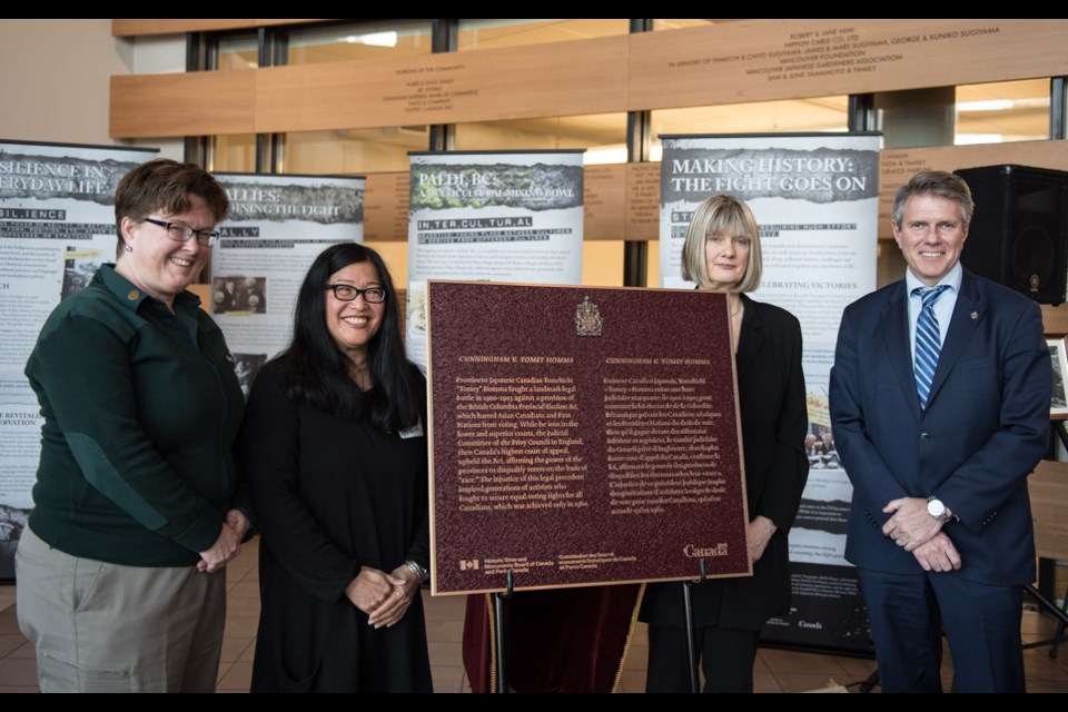 (L-R) Unveiling the new plaque to commemorate the Homma v. Cunningham court case, at the Nikkei National Museum and Cultural Centre were: Tara MacLeod, acting superintendent for Coastal BC Field, Parks Canada and master of ceremonies; Tenney Homma, granddaughter of Tomekichi Homma; Andrea Geiger, associate professor, department of history, Simon Fraser University; and John Aldag, Member of Parliament for Cloverdale-Langley City. Parks Canada photo.