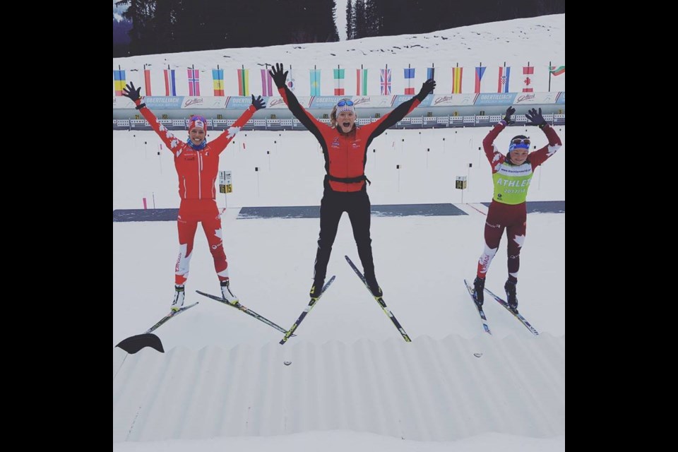 Three B.C. girls on the BMW World Cup circuit - from left, Megan Tandy of Prince George, Sarah Beaudry of Prince George and Nadia Moser of Atlin - jump for joy prior to Thursday's 7.5 km sprint race in Oberhof, Germany. Beaudry finished a career-best 23rd and Tandy was 59th out of 92 racers. Both qualified for Saturday's pursuit along with Julia Ransom of Kelowna, who placed ninth.