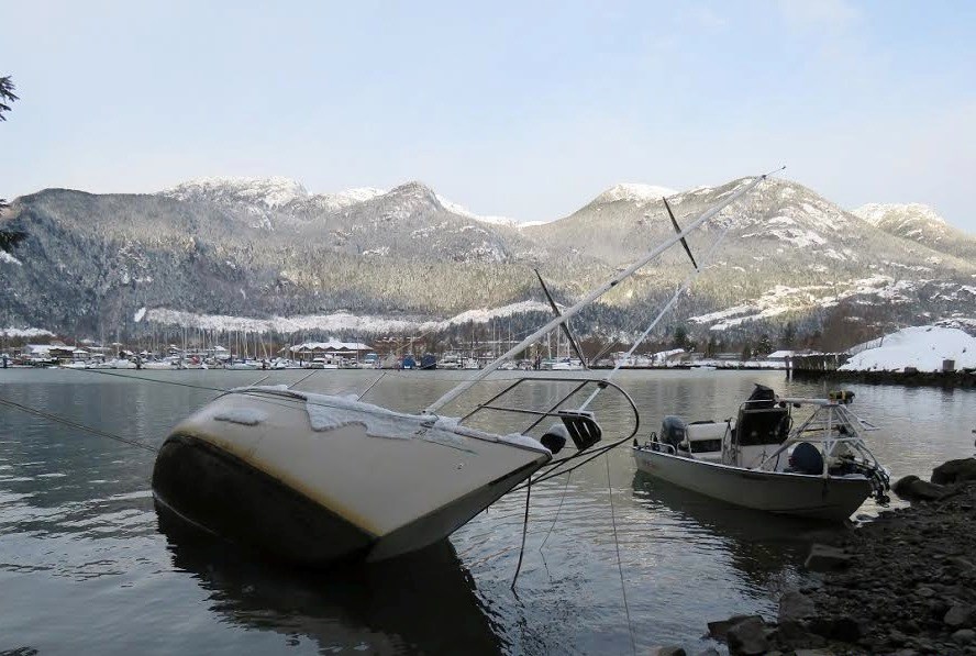 Photo taken Jan. 1 by John Buchanan, showing the sunken vessel tied off on shore.