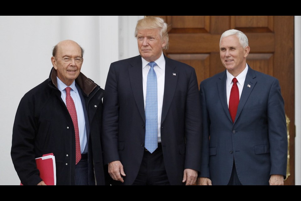 U.S. Commerce Secretary Wilbur Ross, seen here with President Donald Trump and Vice-President Mike Pence, received an application from a Washington state paper mill to have a duty imposed. He also had a letter from newspaper publishers that it was just a shakedown effort from a single producer that should be ignored.