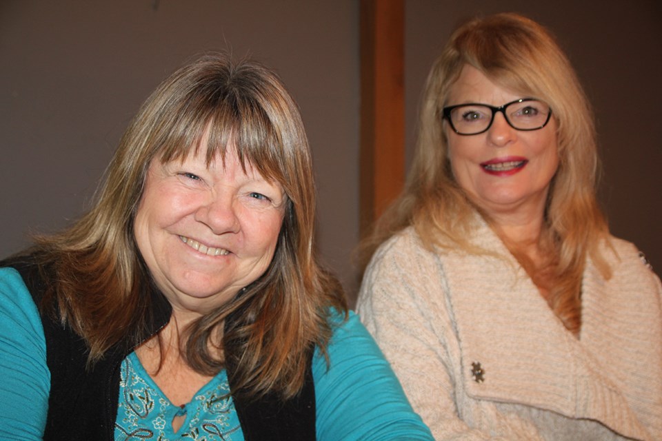 Susan Nelson takes a seat with Annie O’Dea.