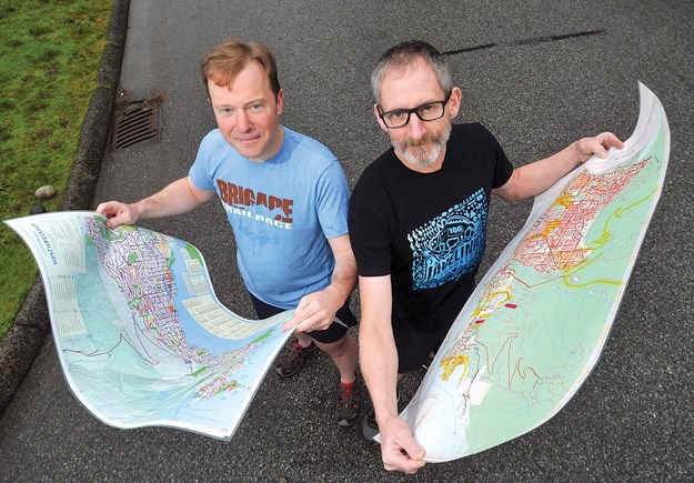North Vancouver residents David Crerar and Mike Senior chart their running prowess. Both have spent years running every single accessible road on the North Shore. PHOTO Paul McGrath