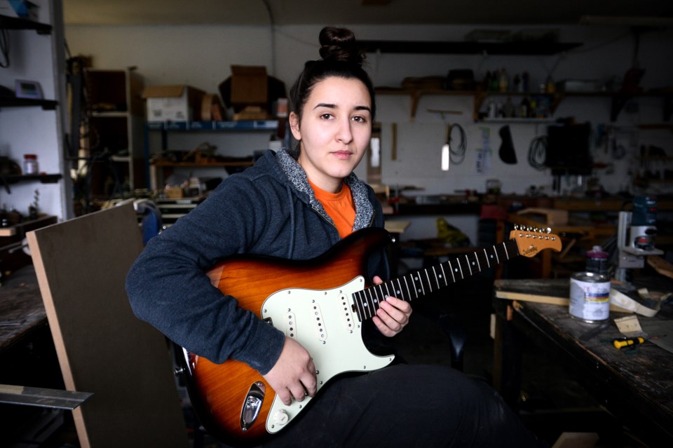 Vancouver luthier Meredith Coloma is considering moving her business to Surrey or Maple Ridge in lig