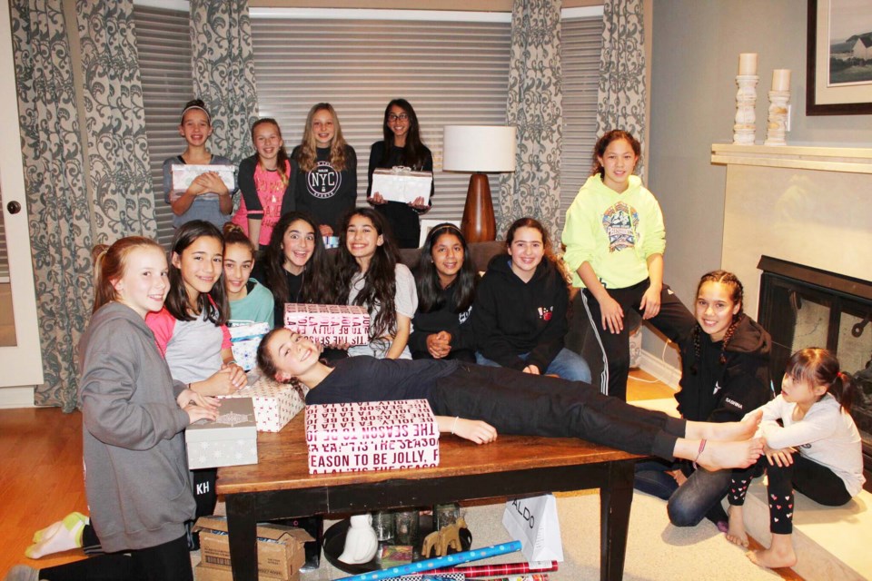 Richmond Girls Soccer Association collected and filled 72 shoeboxes from players and their families in aid of the The Shoebox Project for Shelters program, which collects and distributes gifts to women who are homeless or at-risk of homelessness.