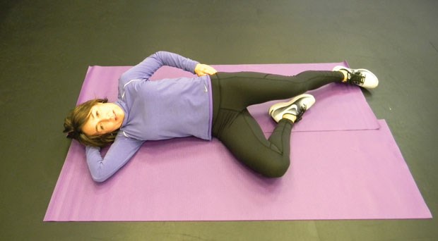 Supine lateral hip stretch