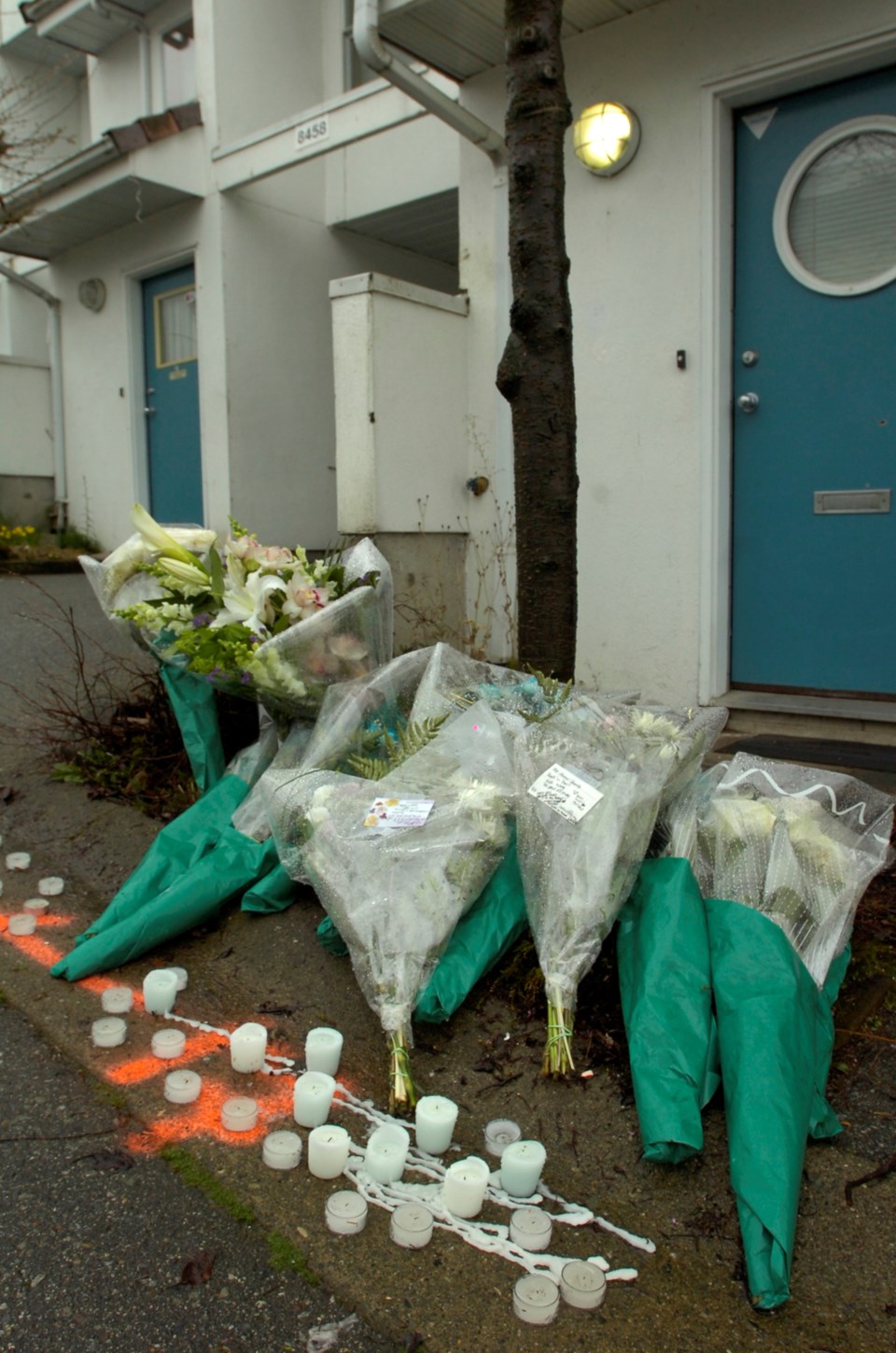 A memorial to 20 year old Kyle Richard Wong, gunned down outside his Aqua Drive townhouse in SE Vanc