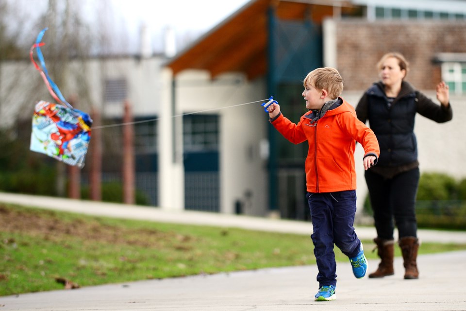 The Maskall family caught some gusts with their kites outside Shadbolt Centre.