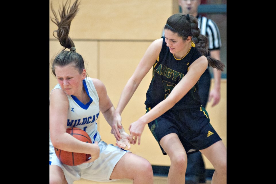 A determined Liz Kennedy and the McMath Wildcats were firing on all cylinders in Saturday's 83-45 win over Argyle to repeat as champions at the Bob Carkner Memorial Classic. McMath shot over 50 percent from the field in the opening half, scoring 56 points.