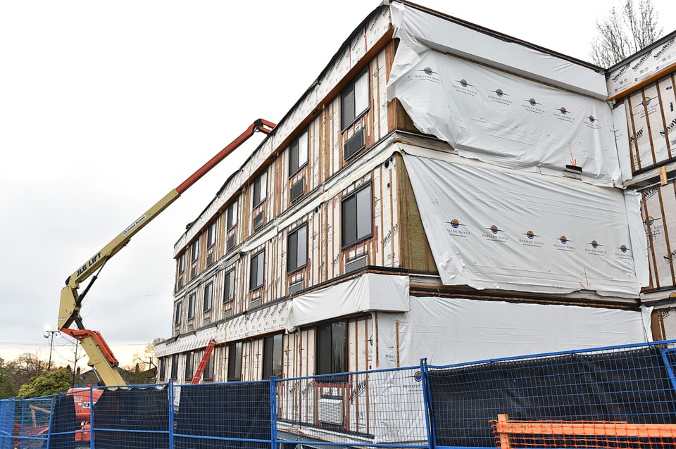 A 78-unit temporary modular housing complex will open next month at West 59th Avenue and Heather Str