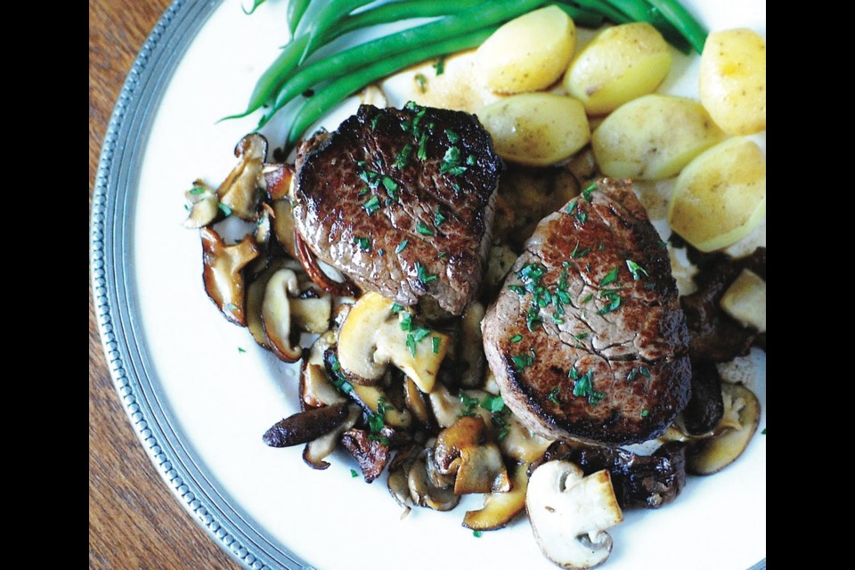 This version of the late French chef Paul Bocuse's tournedos forestière sees small, tender beef steaks set on croutons and served with sautéed mushrooms and a simple, but rich sauce.