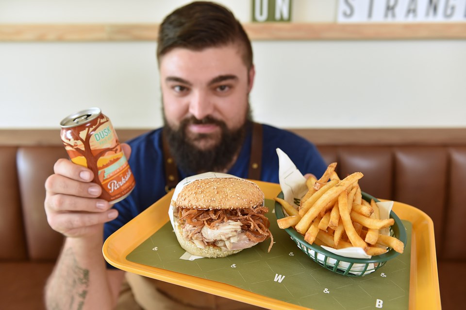 Chef Alessandro Vianello with his beer-brined roasted chicken