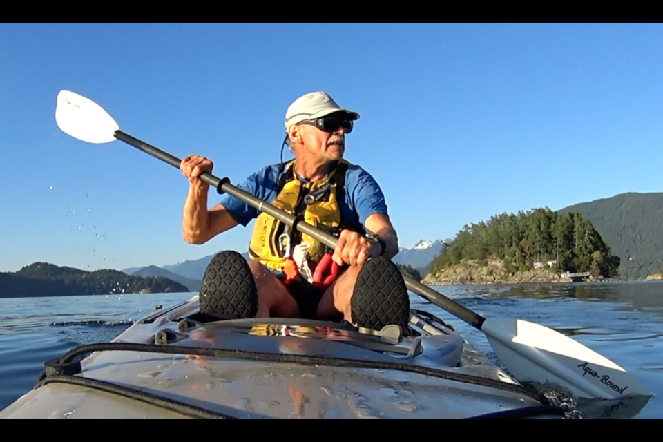 Bob Turner in his kayak, heading off on a Howe Sound adventure.
