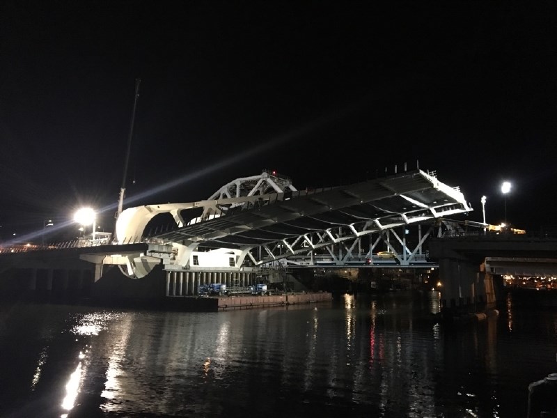 The Johnson Street Bridge undergoes a test lift on Monday night. Feb. 5, 2018