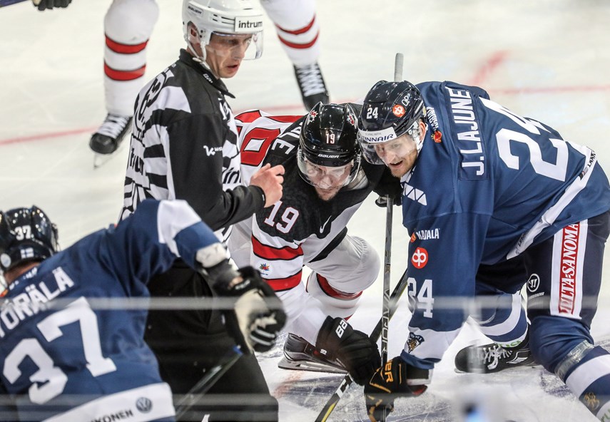 North Vancouver’s Gilbert Brule takes a faceoff for Team Canada during a pre-Olympic competition. Brule is one of several athletes with North Shore ties who will be going for gold at the Winter Olympics running Feb. 9-25 in South Korea. photo Juha Saastamoinen/Hockey Canada Images