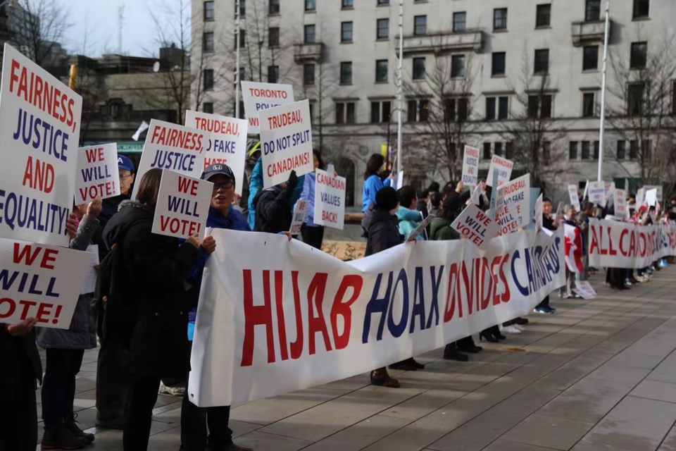 Protesters call for apology from Trudeau following Toronto hijab incident. Image submitted Frank Xu