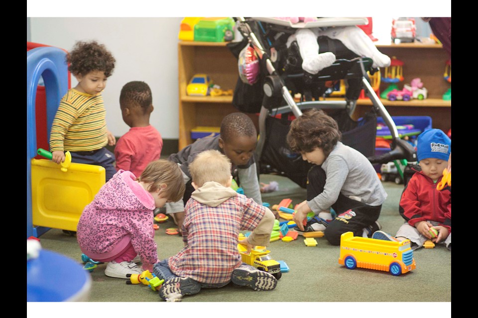 Kids playing at the Parents Connect program. The program has been running in New Westminster since 1993. It matches families new to Canada with mentor families who have lived in Canada for a long time. The newcomers and volunteers come together to learn parenting techniques. Mentor families offer support and knowledge about Canadian culture, raising children in Canada and tips on local programs in communities. Photo courtesy FSGV