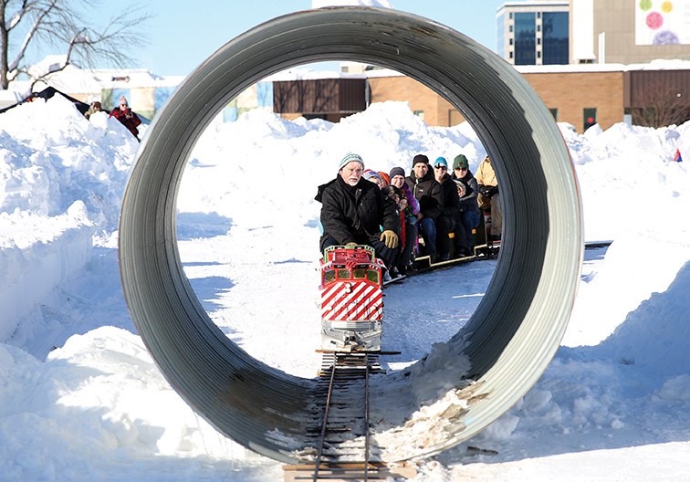 The Cottonwood Express Minirail Train from the Central BC Railway and Forestry Museum drove passengers around the track on Sunday morning as part of Downtown Winterfest.