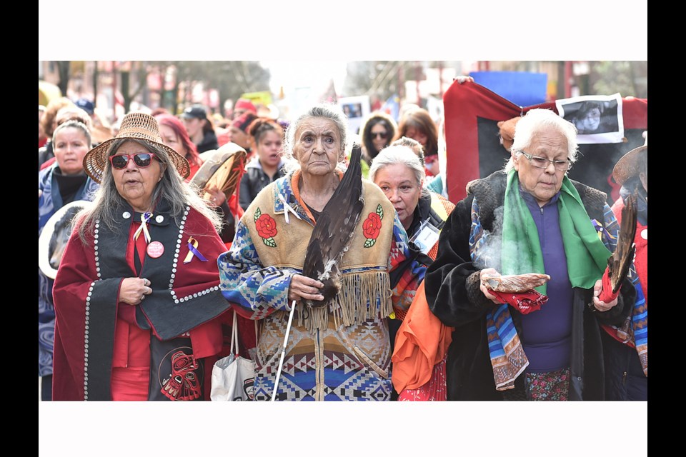 The Women's Memorial March in Vancouver's DTES maintained an air of solemnity and remembrance.