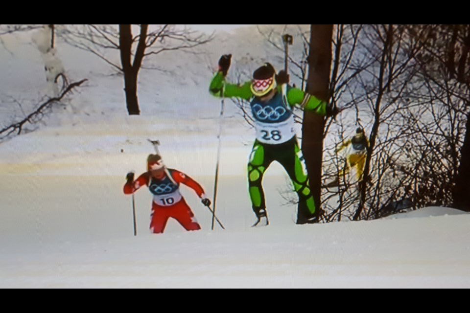 Sarah Beaudry of Prince George chases defending Olympic champion Darya Domraceva of Belarus during the Olympic women's biathlon 15-kilometre race Thursday in Pyeongchang. Beaudry, in her Olympic debut, shot 19-for-20 on the range and finished 28th out of 87 entrants.