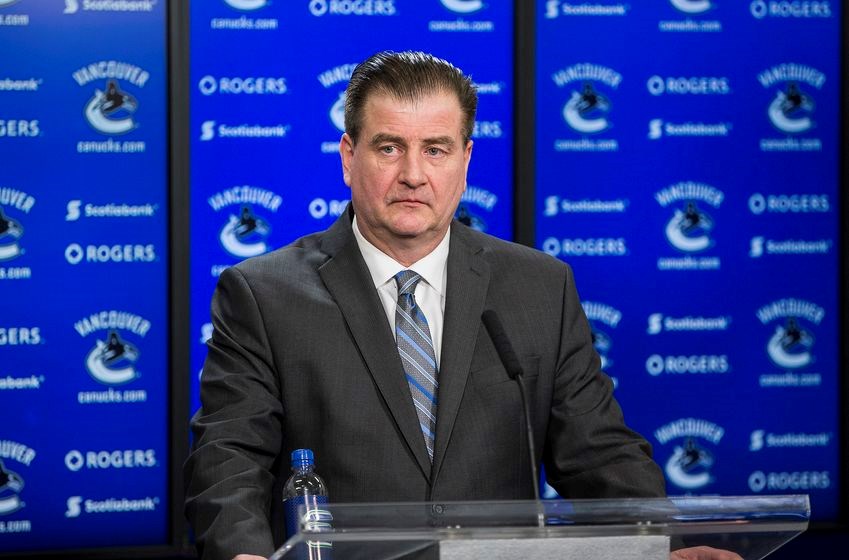 Jim Benning at the podium