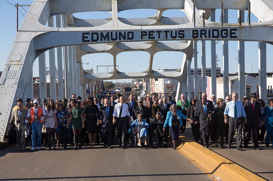 Obamas cross Selma bridge