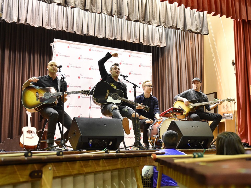 Members of Hedley recently performed at a MusiCounts charity event at Sir Alexander Mackenzie elemen