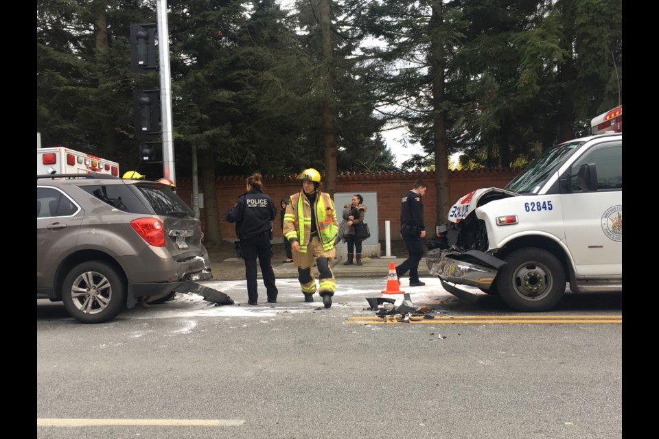 Ambulance crashes with SUV outside a Richmond temple on Steveston Highway. Image / Kacy Wu